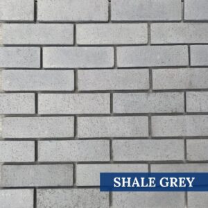 Close-up view of Innovative Stonecraft's Shale Grey stone finish, showcasing its classic and versatile design.